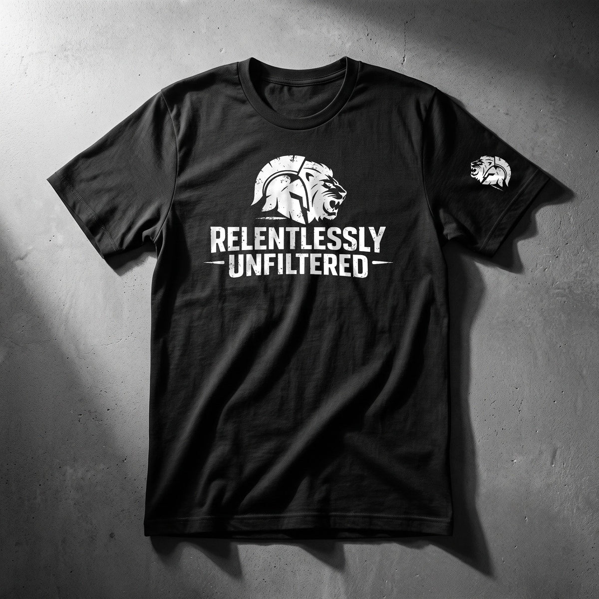Relentlessly Unfiltered black tee, front: white lion logo print with the RU lion on the sleeve